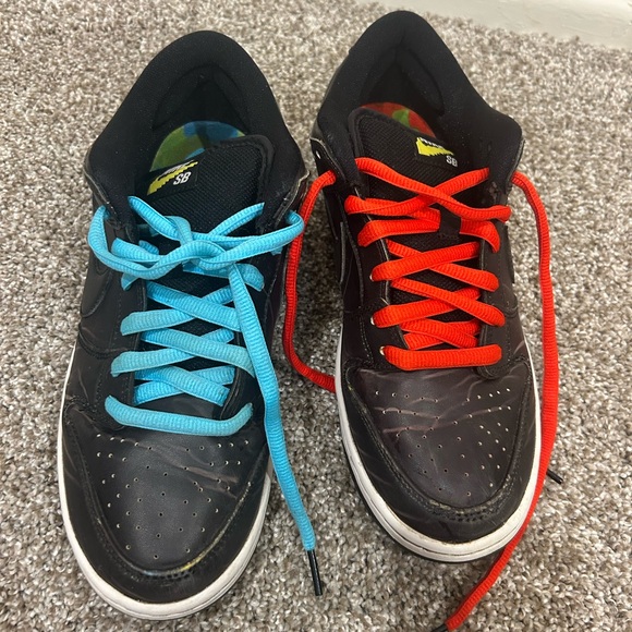 Nike Black Athletic Shoes with Blue and Red Accents - Picture 1 of 7